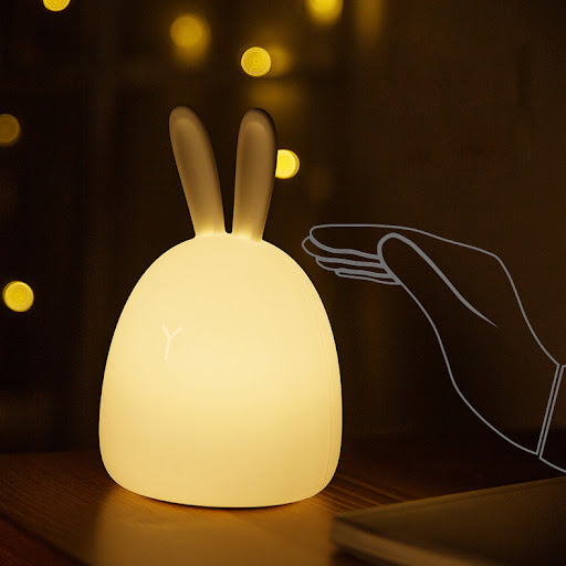 Title 2, Fat Rabbit Colorful Pat Silicone Lamp is a soft...