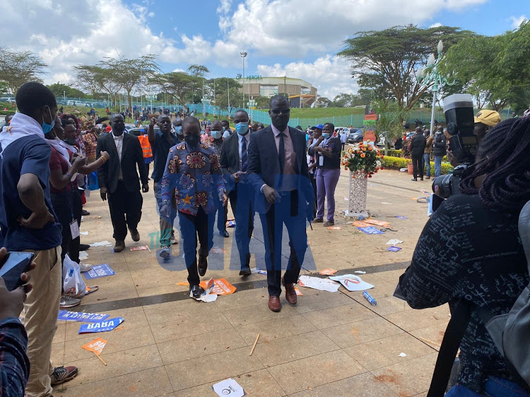 ICT CS Joe Mucheru makes his way inside Kasarani Stadium ahead of the Azimio La Umoja event on December 10, 2021.