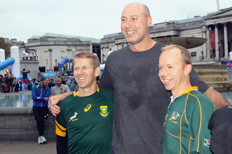 Retired Springbok, Mark Andrews with fans during the 1995 Springboks Jog the Memory event at Trafalgar Square on October 24, 2015 in London, England.