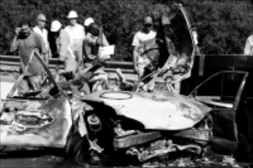 MANGLED WRECK: The wreckage of car in which a woman died after an accident on the N3 highway yesterday. 20/04/2009. Pic. Bafana Mahlangu. © Sowetan.