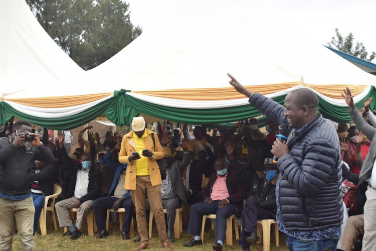 Parliamentary committee on delegated legislation chairman William Kamket speaks to farmers when the committee visited farmers to take views .