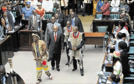 CHIEFS' INDABA: President Jacob Zuma, with chairman of the National House of Traditional Leaders Kgosi Makeru Maubane and other leaders, arriving in Parliament yesterday. photo: KOPANO TLAPE