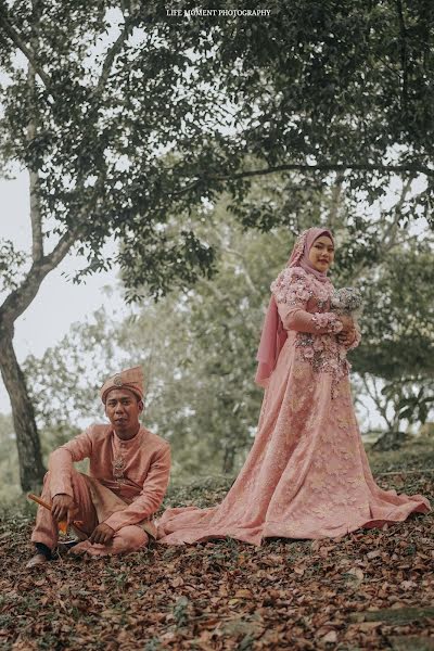 Fotógrafo de casamento Razlam Abd Raji (lifemomentphoto). Foto de 9 de dezembro 2019