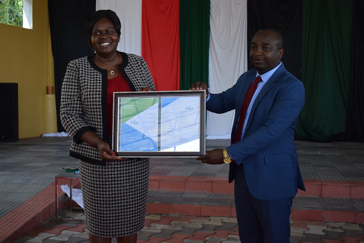 Homa Bay Governor Gladys Wanga with National Housing Corporation Managing Director David Mathu in Homa Bay town on October 4,2023