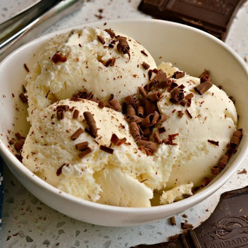 This smooth and creamy rich vanilla ice cream takes less than five minutes to prepare for the ice cream maker.  It has no artificial ingredients and is made with only wholesome natural ingredients.  Be sure to read the section on recipe variations.