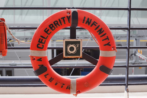 A life preserver, sometimes called a lifebuoy or personal flotation device, aboard Celebrity Infinity. 