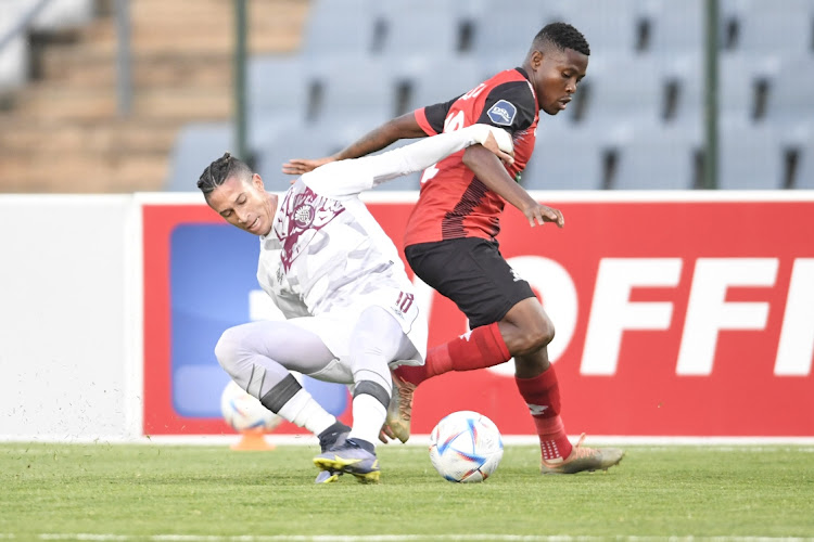 Gregory Damons of Swallows FC and Tumelo Njoti of Maritzburg United in action at Dobsonville Stadium in Johannesburg, April 27 2023. Picture: LEFTY SHIVAMBU/GALLO IMAGES