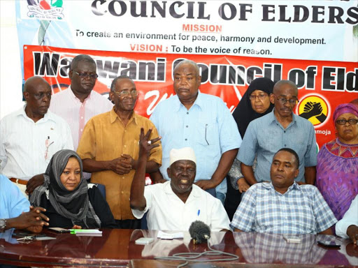 Members of the Mombasa County Council of Elders address the press at Uhuru na Kazi building, November 21, 2017 /JOHN CHESOLI