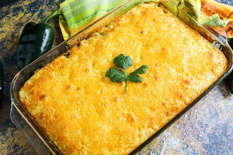 Mexican Cornbread Casserole Ready To Be Sliced.