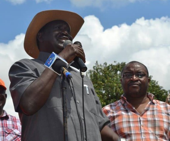 ODM Kwale branch official Nicholas Zani looks on as party leader Raila Odinga speaks during a past campaign meeting in Kwale.