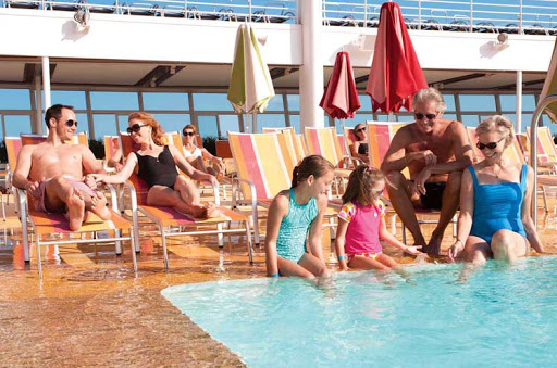 On the pool deck of Allure of the Seas: Make your next vacation a multigenerational affair.