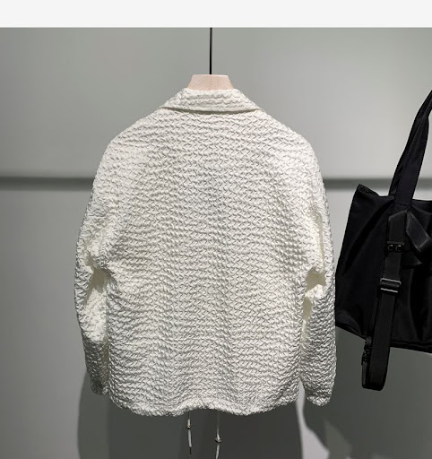 Title 2, New loose long-sleeved coat with polo collar. P...