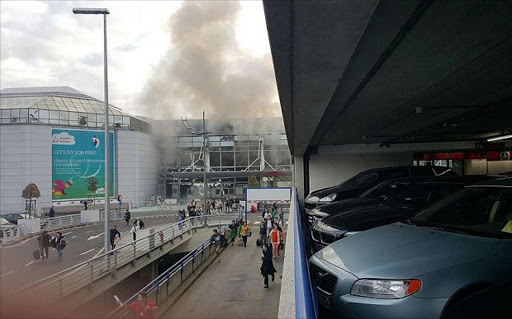 People evacuating the Brussels’ Zaventem airport following a blast. Picture Credit: The Telegraph