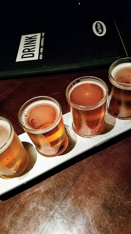 Yard House Portland offers 130 taps with a keg room holding over 5000 gallons of beer. You can order beer in multiple sizes, including putting together your own sampler tray