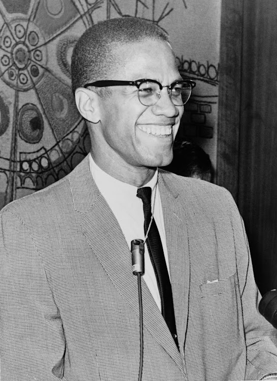 Malcolm X wearing the browline shape.