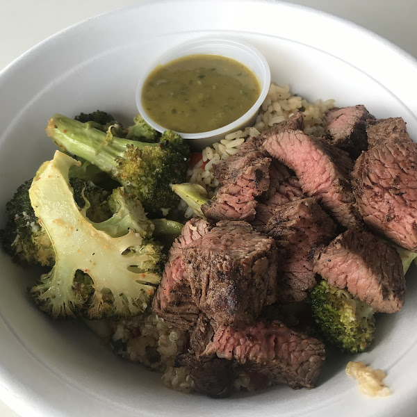 Perfect spice rice with veggie quinoa then topped with Parmesan broccoli and herb grilled steak ($1.50 up-charge) with the herb balsamic vinaigrette. So good!