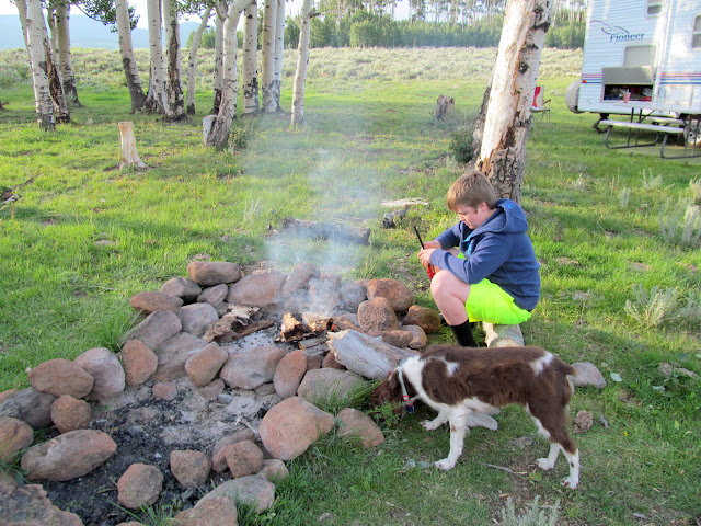 Bradley getting a campfire going