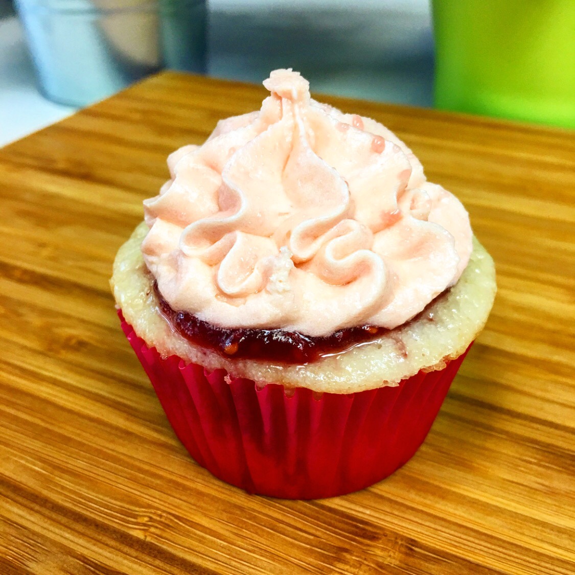 Vanilla Cupcake with Raspberry Filling