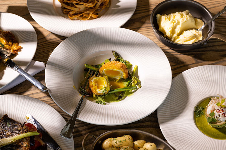 Blistered asparagus with a panko-crusted boiled egg.