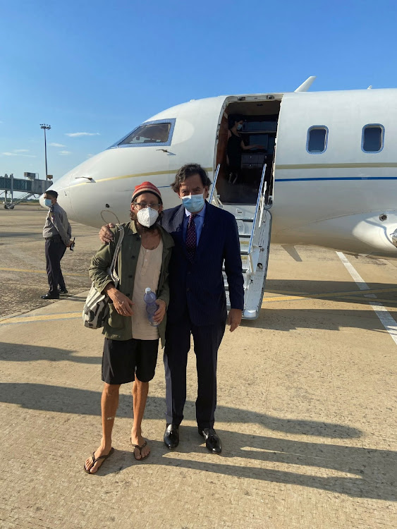 New Mexico Governor Bill Richardson poses for a picture with American journalist Danny Fenster following his release from prison in Myanmar, in this undated picture uploaded on Twitter November 15, 2021 and obtained by Reuters.