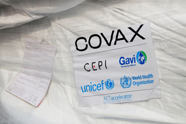 A pack of AstraZeneca/Oxford vaccines is seen as the country receives its first batch of coronavirus disease (COVID-19) vaccines under COVAX scheme, at the international airtport of Accra, Ghana February 24, 2021.