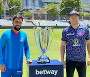 Mumbai Indians Cape Town (MI Cape Town) captain Rashid Khan with Paarl Royals counterpart David Miller ahead of the start of the SA20 tournament at Newlands Stadium on Tuesday.