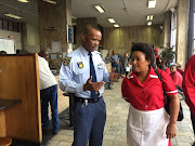 Warrant officer Patrick Ngubane and EFF's MPL Mandisa Mashego.
