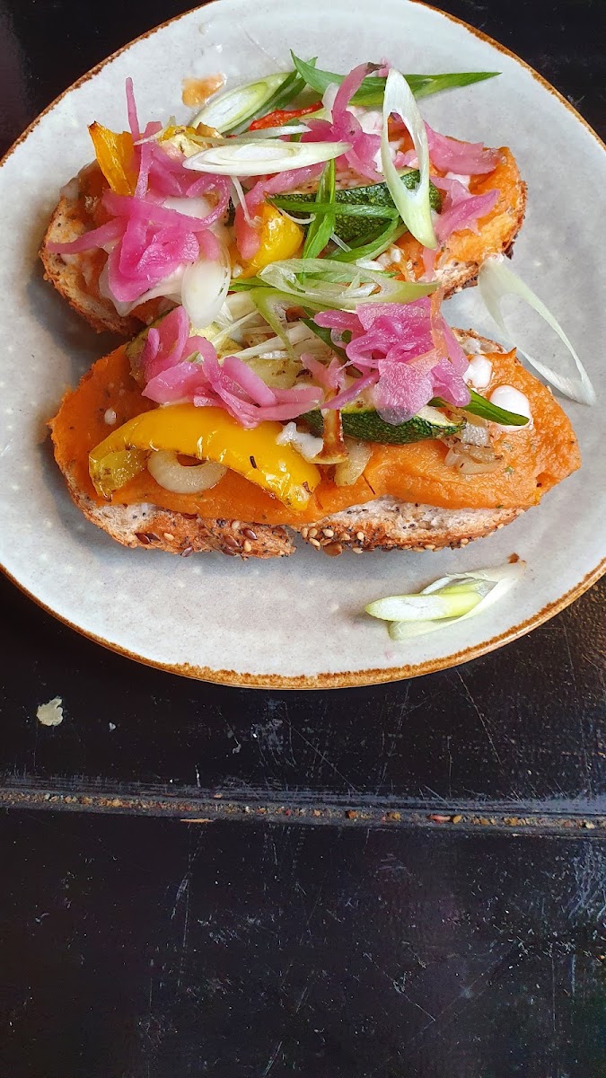 Sweet potato on bread with vegan feta and vegetables