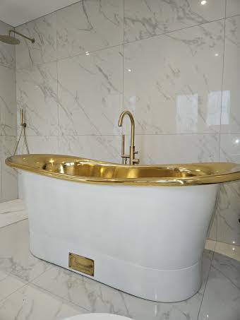 Free standing Bath in Brass album cover