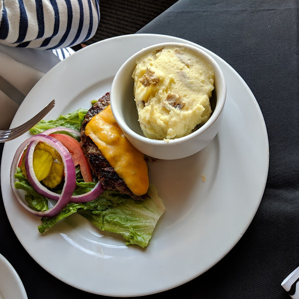 my children ordered a cheeseburger meal with mashed potatoes to share in the kitchen brought it out already split on two plates