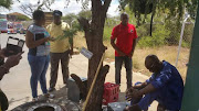 Workers at a Northern Cape have to eat and change here. The sign says “designated lunch area”. Picture Credit: Tichaona Jongwe/GroundUp