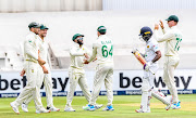 Temba Bavuma of South Africa catches the ball and celebrate with teammates during day 3 of the 2nd Betway Test (WTC) match between South Africa and Sri Lanka at Imperial Wanderers on January 05, 2021 in Johannesburg, South Africa. 