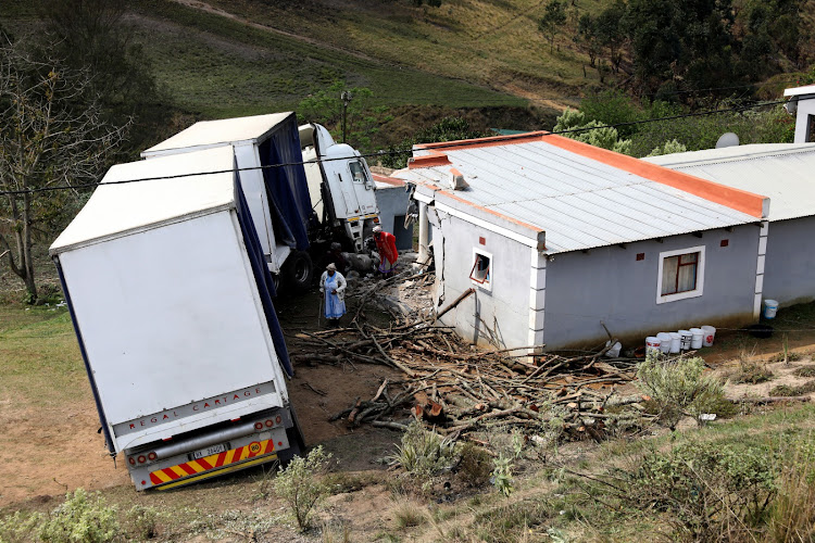 Litha Ntobela was awakened by a 'boom' sound after a truck veered off the road and crashed into her house.