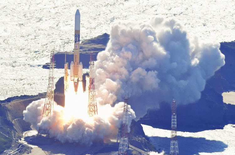 H-IIA rocket carrying the national space agency's moon lander is launched at Tanegashima Space Center on the southwestern island of Tanegashima, Japan in this photo taken by Kyodo on September 7, 2023.