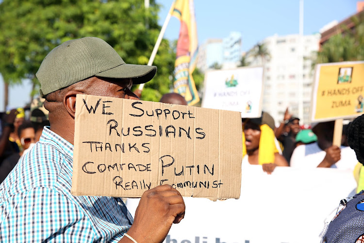 Supporters of former president Jacob Zuma march to the Durban High Court on April 6 2018 as he makes his first court appearance.