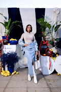 K Naomi attends Bombay event in Hyde Park, Johannesburg 