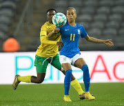 Karabo Dhlamini of SA challenges Adriana Leal da Silva of Brazil in friendly match at Orlando Stadium on September 2 2022.