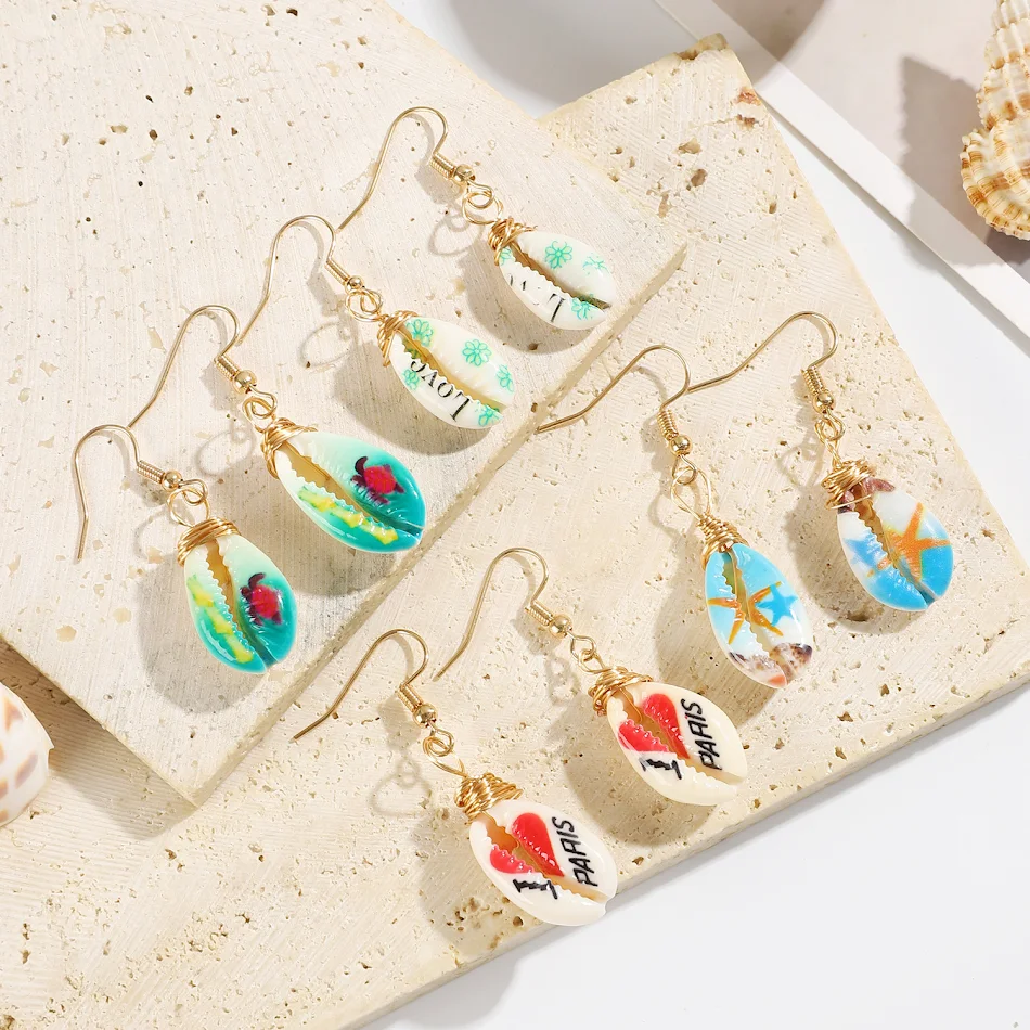 Creatieve strandprint schelp oorhaken voor dames, lichtgewicht en trendy, perfect voor de zomer, strand en casual outfits.