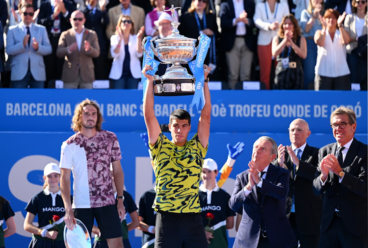 Carlos Alcaraz of Spain lifts the trophy after beating Stefanos Tsitsipas of Greece at Real Club De Tenis Barcelona in Barcelona, Spain, April 23 2023. Picture: DAVID RAMOS/GETTY IMAGES