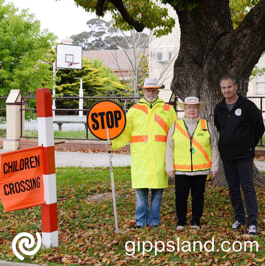 School Crossing Supervisors Len (18 months) and Pam Lyndon (13 years) with Wellington Shire Council Mayor Ian Bye