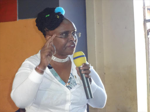 Gladys Chania speaking during a public participation forum in Thika town on October 31, 2018. /JOHN KAMAU