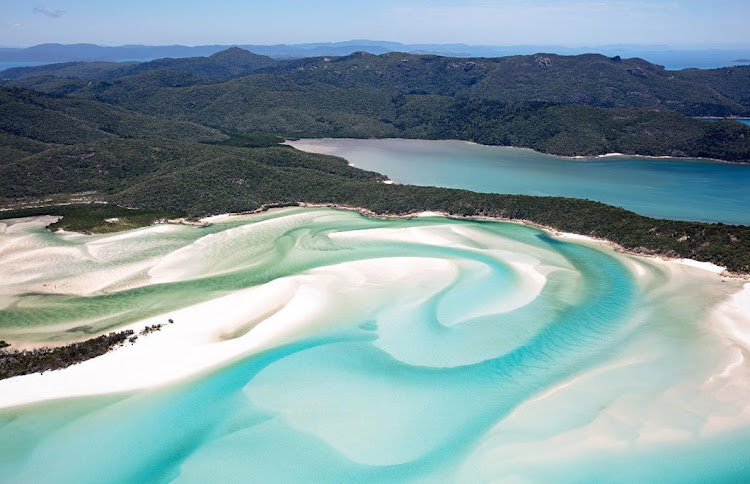 Stretching across 7km, this brilliant white silica sand beach is among one of the purest in the world. The largest of 74 islands in the Whitsundays, the island is in the heart of the Great Barrier Reef. As well as being one of the world’s most unspoiled and beautiful beaches, the sand doesn’t retain heat, so it’s a fantastic place to walk barefoot, even on a hot day.