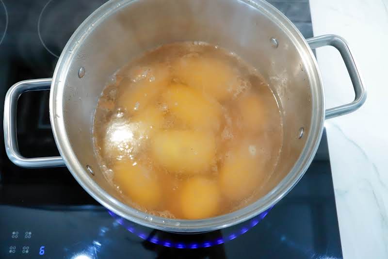 Boiling Potatoes.