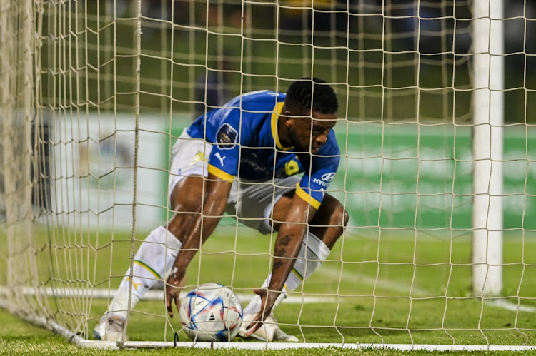 Sipho Mbule fetches the ball from the net after scoring for Mamelodi Sundowns in the DStv Premiership match against Lamontville Golden Arrows at Princess Magogo Stadium in Durban on April 12 2023.