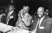 SETTLING CONFLICT:  Cyril Ramaphosa, Nelson Mandela and Jacob Zuma at the Codesa negotiations.   Photo: Soullier Kuus