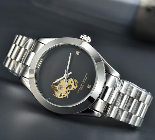 Title 13, Hollow Mens Mechanical Casual Watch, a stylish...