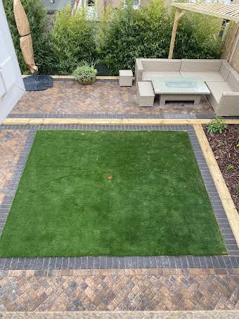 Terrace house patio with raised paving area album cover