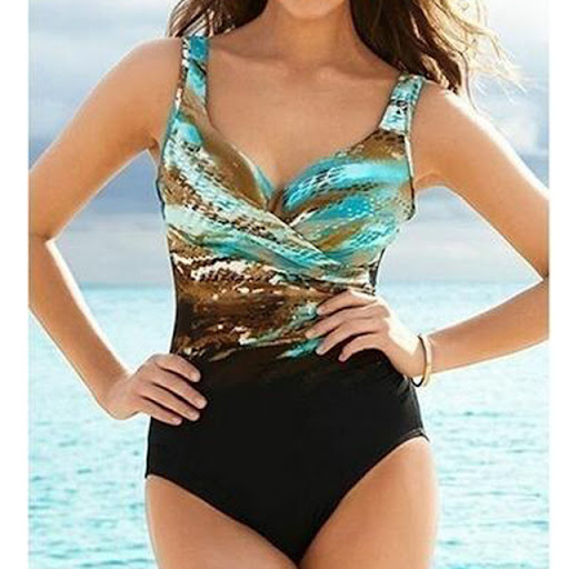 Title 2, Womens one-piece holiday swimsuit. Enjoy sun a...