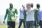 Itumeleng Khune and head coach Stuart Baxter share some light moment during the South African national mens soccer team training session at Steyn City School on November 13, 2018 in Johannesburg, South Africa. 