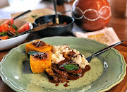 Vegetable curry with butternut squares.